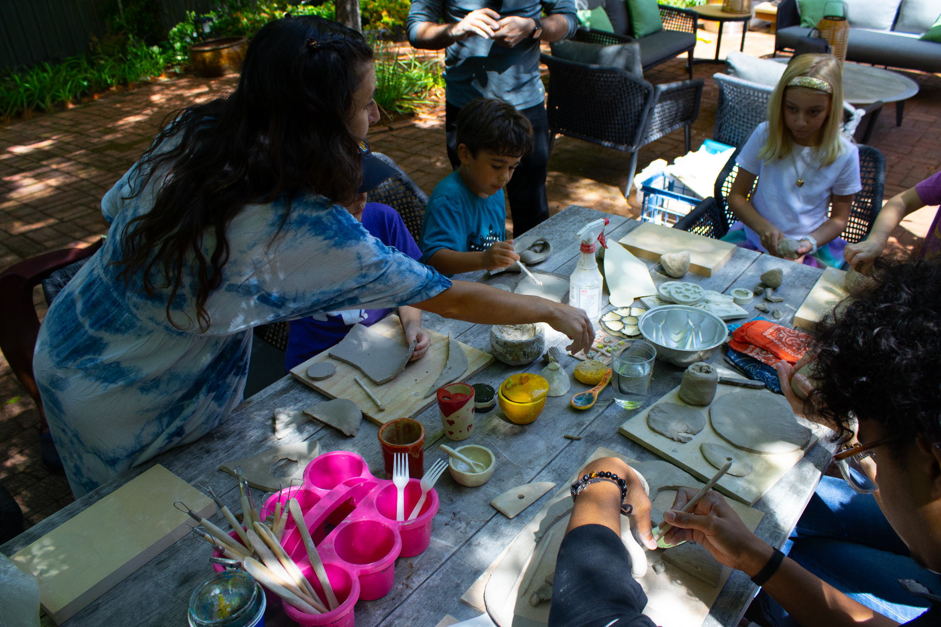 Summer pottery classes in a sunlit studio